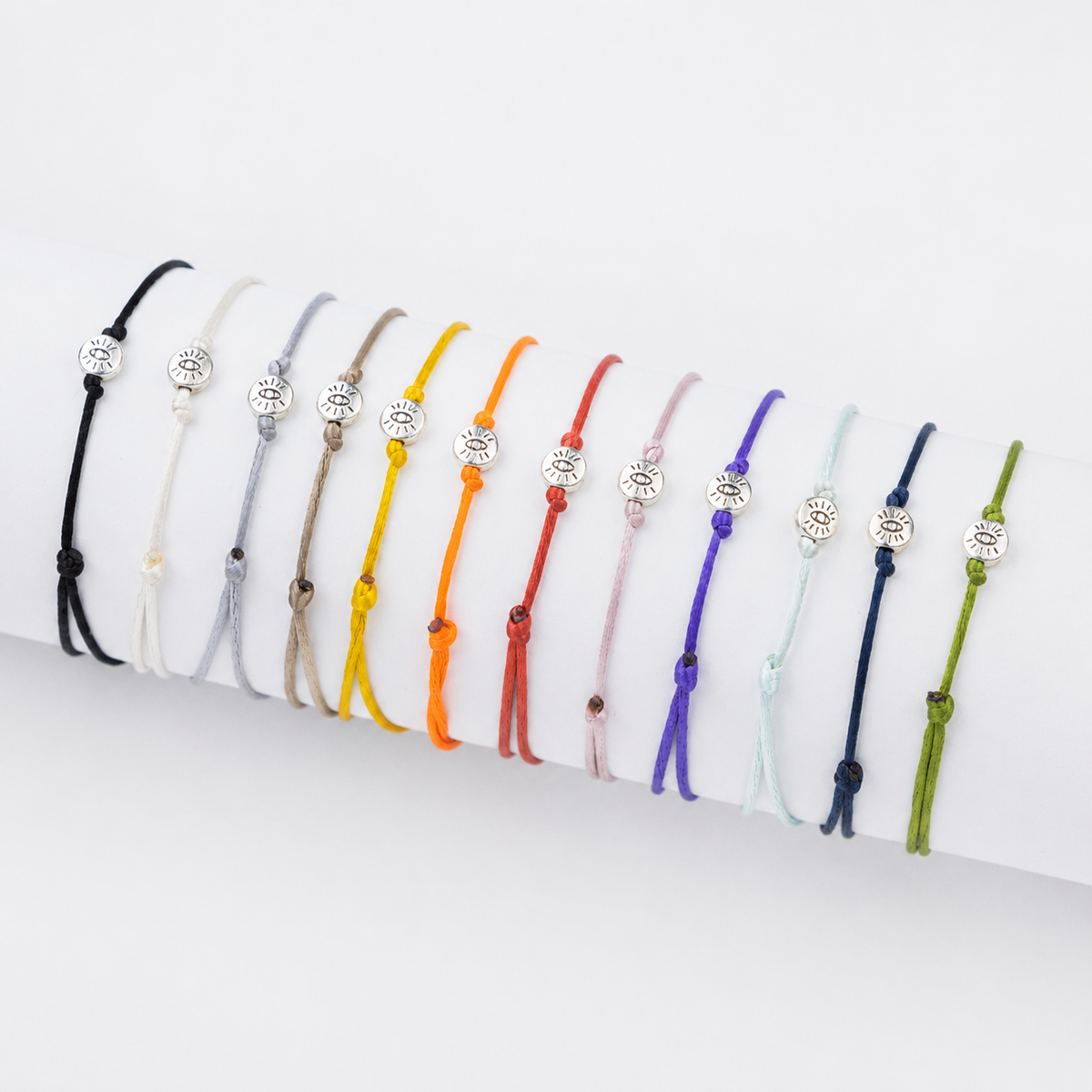 Pulseira Vigia — detalhe do pingente de olho grego