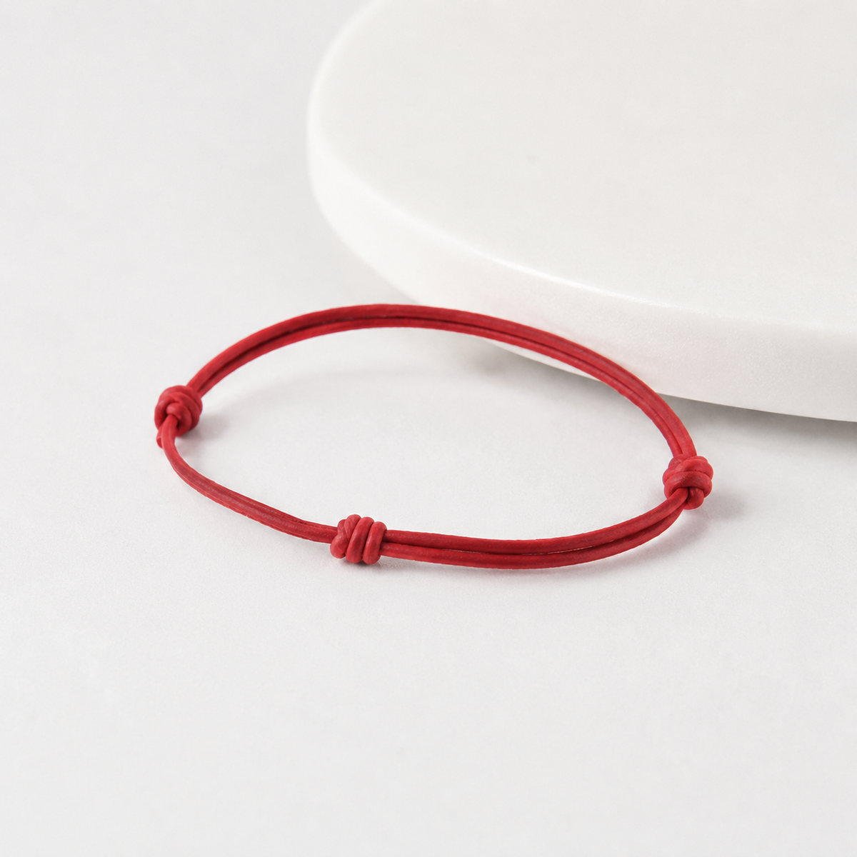 Pulseira Rédea — pulseira masculina de couro trançado, detalhe da textura